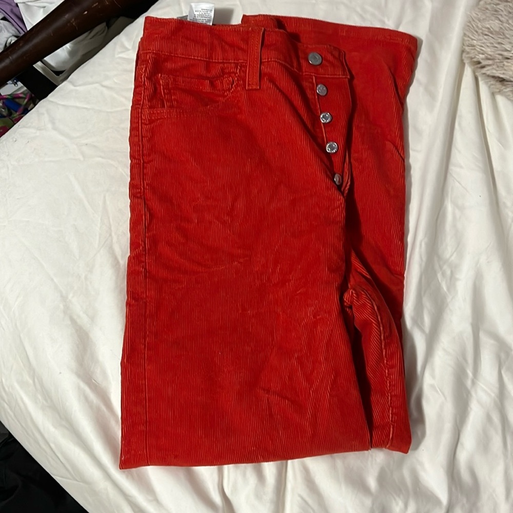 red corduroy levi pants